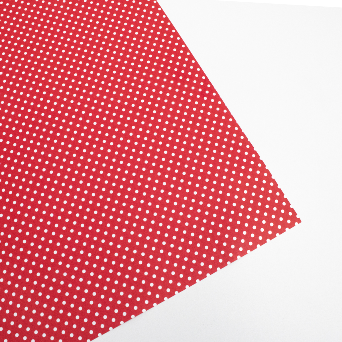 Papel de regalo punteado rojo