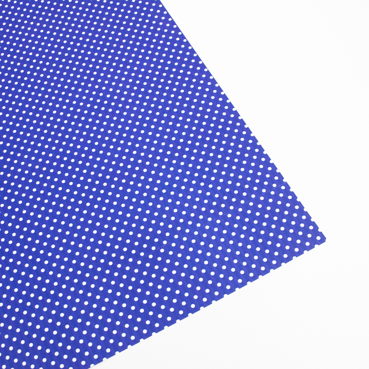 Papel de regalo punteado azul