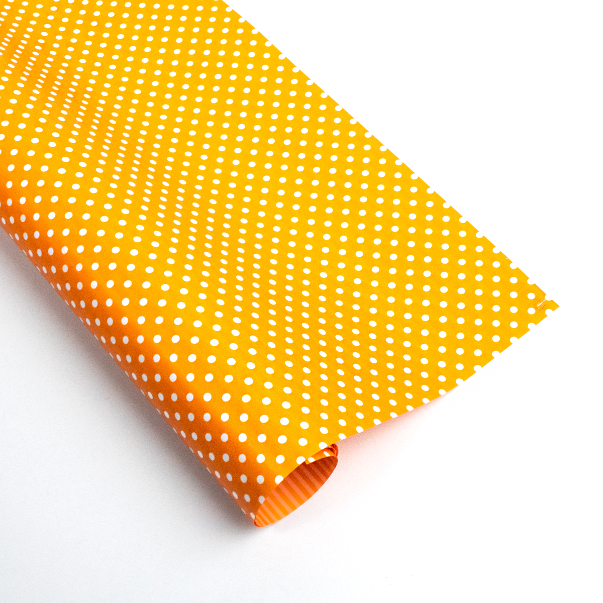Papel de regalo punteado naranja